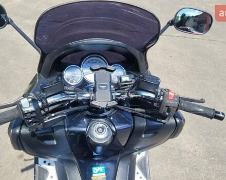 Серый Ямаха T-Max 500, объемом двигателя 0.5 л и пробегом 47 тыс. км за 4800 $, фото 2 на Automoto.ua