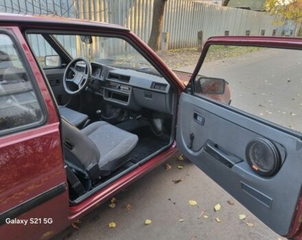 Красный ЗАЗ 1102 Таврия, объемом двигателя 1.1 л и пробегом 155 тыс. км за 1099 $, фото 6 на Automoto.ua