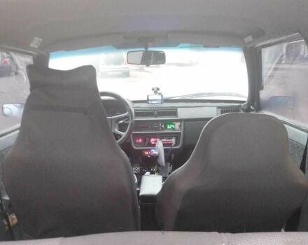 Красный ЗАЗ 1102 Таврия, объемом двигателя 1.2 л и пробегом 150 тыс. км за 1800 $, фото 9 на Automoto.ua