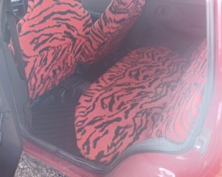 Красный ЗАЗ 1102 Таврия, объемом двигателя 1.2 л и пробегом 210 тыс. км за 1070 $, фото 1 на Automoto.ua