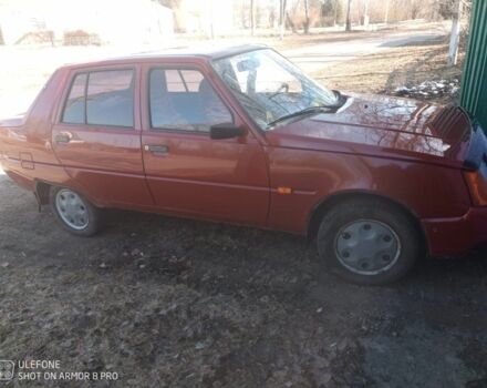 Красный ЗАЗ 1102 Таврия, объемом двигателя 1.2 л и пробегом 210 тыс. км за 1070 $, фото 2 на Automoto.ua