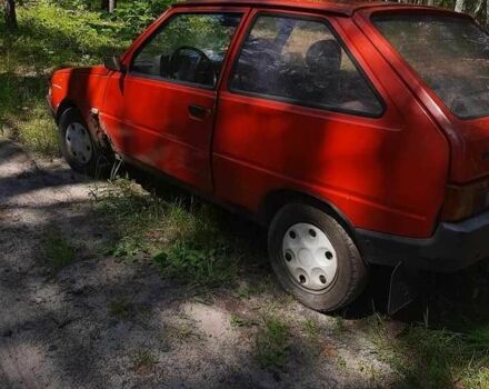 Красный ЗАЗ 1102 Таврия, объемом двигателя 1.1 л и пробегом 180 тыс. км за 150 $, фото 1 на Automoto.ua