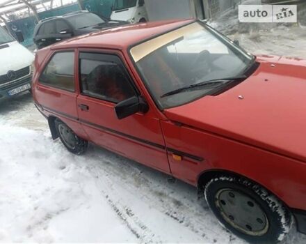 Красный ЗАЗ 1102 Таврия, объемом двигателя 1.1 л и пробегом 250 тыс. км за 600 $, фото 1 на Automoto.ua