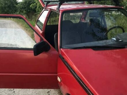 Красный ЗАЗ 1102 Таврия, объемом двигателя 1.2 л и пробегом 200 тыс. км за 641 $, фото 1 на Automoto.ua