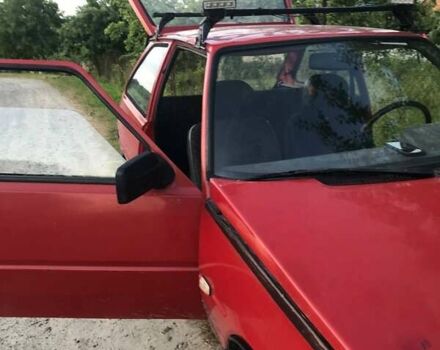 Червоний ЗАЗ 1102 Таврія, об'ємом двигуна 1.2 л та пробігом 200 тис. км за 641 $, фото 1 на Automoto.ua