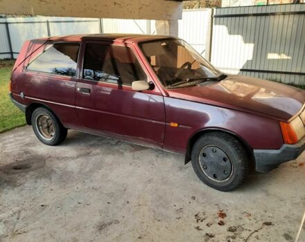 Красный ЗАЗ 1102 Таврия, объемом двигателя 1.2 л и пробегом 250 тыс. км за 592 $, фото 1 на Automoto.ua