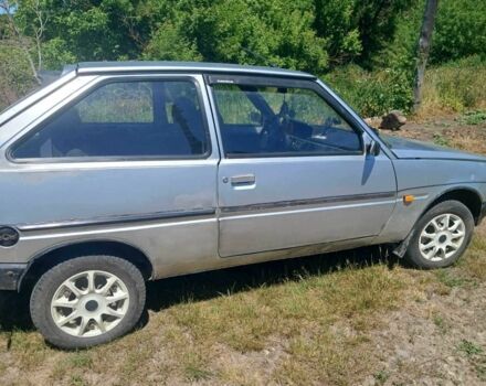 ЗАЗ 1102 Таврия-Нова 2004 у Каменце-Подольском на Automoto.ua Сірий ЗАЗ 1102 Таврия-Нова, об'ємом двигуна 1.2 л та пробігом 70 тис. км за 699 $, фото 6 на Automoto.ua