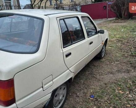 ЗАЗ 1103 Славута 2003 в Киеве на Automoto.ua Бежевый ЗАЗ 1103 Славута, объемом двигателя 1.2 л и пробегом 150 тыс. км за 700 $, фото 2 на Automoto.ua