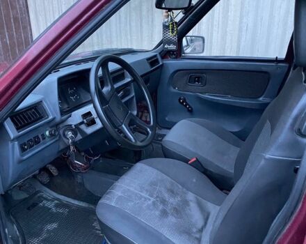 ЗАЗ 1103 Славута 2005 в Черняхове на Automoto.ua Красный ЗАЗ 1103 Славута, объемом двигателя 1.2 л и пробегом 242 тыс. км за 600 $, фото 9 на Automoto.ua