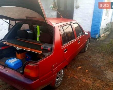 Красный ЗАЗ 1103 Славута, объемом двигателя 1.1 л и пробегом 238 тыс. км за 400 $, фото 6 на Automoto.ua