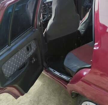 Красный ЗАЗ 1103 Славута, объемом двигателя 1.3 л и пробегом 142 тыс. км за 2000 $, фото 1 на Automoto.ua