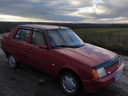 Красный ЗАЗ 1103 Славута, объемом двигателя 1.3 л и пробегом 112 тыс. км за 1300 $, фото 1 на Automoto.ua