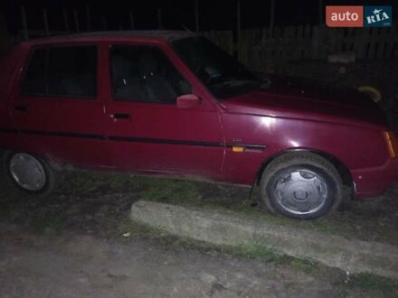 ЗАЗ 1103 Славута 2003 у Житомирі на Automoto.ua Червоний ЗАЗ 1103 Славута, об'ємом двигуна 1.2 л та пробігом 200 тис. км за 1100 $, фото 1 на Automoto.ua