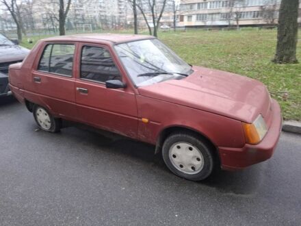 Красный ЗАЗ 1103 Славута, объемом двигателя 1 л и пробегом 250 тыс. км за 593 $, фото 1 на Automoto.ua