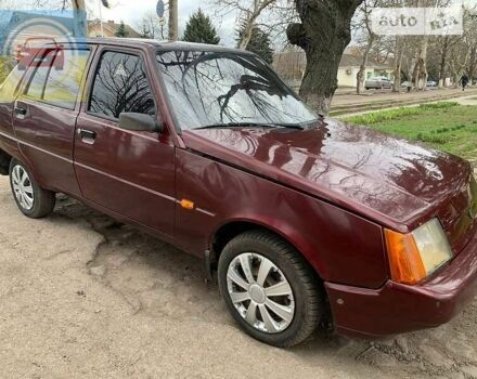 Красный ЗАЗ 1103 Славута, объемом двигателя 1 л и пробегом 200 тыс. км за 600 $, фото 1 на Automoto.ua