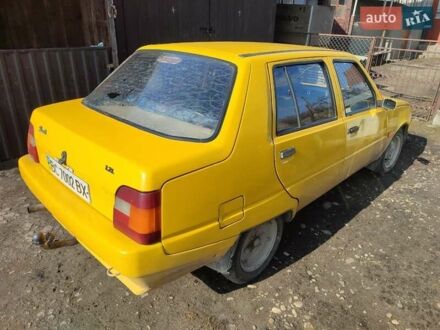 Желтый ЗАЗ 1103 Славута, объемом двигателя 1.2 л и пробегом 100 тыс. км за 600 $, фото 1 на Automoto.ua