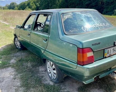 Зеленый ЗАЗ 1103 Славута, объемом двигателя 1 л и пробегом 105 тыс. км за 900 $, фото 4 на Automoto.ua