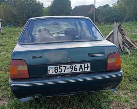 Зеленый ЗАЗ 1103 Славута, объемом двигателя 1.2 л и пробегом 300 тыс. км за 600 $, фото 1 на Automoto.ua