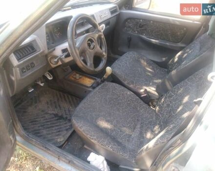 Зеленый ЗАЗ 1103 Славута, объемом двигателя 1.2 л и пробегом 170 тыс. км за 700 $, фото 6 на Automoto.ua