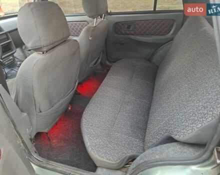 Зеленый ЗАЗ 1103 Славута, объемом двигателя 1.2 л и пробегом 145 тыс. км за 940 $, фото 3 на Automoto.ua