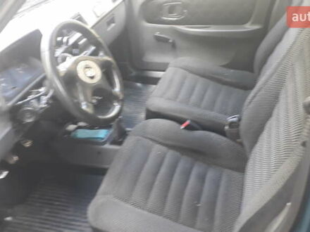 Зеленый ЗАЗ 1103 Славута, объемом двигателя 1.2 л и пробегом 200 тыс. км за 650 $, фото 1 на Automoto.ua