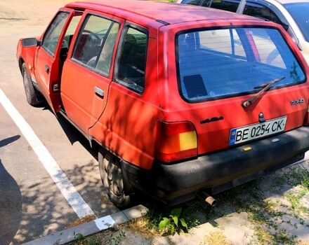 Красный ЗАЗ 1105 Дана, объемом двигателя 1.1 л и пробегом 123 тыс. км за 550 $, фото 3 на Automoto.ua