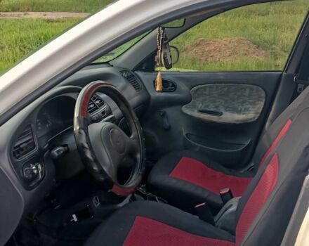 ЗАЗ Ланос 2004 в Александровке на Automoto.ua Белый ЗАЗ Ланос, объемом двигателя 1.5 л и пробегом 175 тыс. км за 1198 $, фото 5 на Automoto.ua