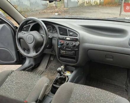 Черный ЗАЗ Ланос, объемом двигателя 1.5 л и пробегом 157 тыс. км за 3000 $, фото 5 на Automoto.ua