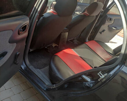 Черный ЗАЗ Ланос, объемом двигателя 1.4 л и пробегом 165 тыс. км за 1800 $, фото 2 на Automoto.ua