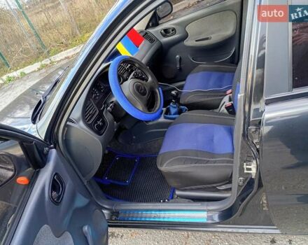 Черный ЗАЗ Ланос, объемом двигателя 1.39 л и пробегом 195 тыс. км за 2000 $, фото 5 на Automoto.ua