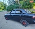 Чорний ЗАЗ Ланос, об'ємом двигуна 1.4 л та пробігом 153 тис. км за 2500 $, фото 1 на Automoto.ua