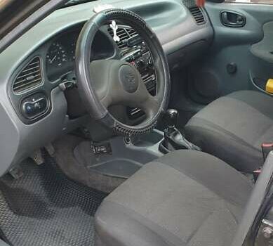 Чорний ЗАЗ Ланос, об'ємом двигуна 1.39 л та пробігом 181 тис. км за 1500 $, фото 13 на Automoto.ua