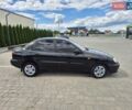 Чорний ЗАЗ Ланос, об'ємом двигуна 1.39 л та пробігом 189 тис. км за 1900 $, фото 6 на Automoto.ua