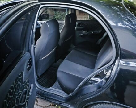 Чорний ЗАЗ Ланос, об'ємом двигуна 1.3 л та пробігом 322 тис. км за 2000 $, фото 8 на Automoto.ua