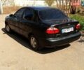 Черный ЗАЗ Ланос, объемом двигателя 1.4 л и пробегом 260 тыс. км за 1800 $, фото 1 на Automoto.ua