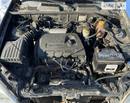 Чорний ЗАЗ Ланос, об'ємом двигуна 1.39 л та пробігом 138 тис. км за 1999 $, фото 34 на Automoto.ua