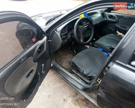 Черный ЗАЗ Ланос, объемом двигателя 1.4 л и пробегом 260 тыс. км за 1800 $, фото 16 на Automoto.ua