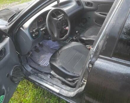 Черный ЗАЗ Ланос, объемом двигателя 1.5 л и пробегом 200 тыс. км за 1700 $, фото 1 на Automoto.ua