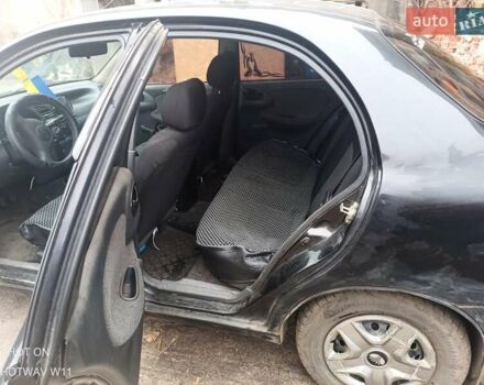 Черный ЗАЗ Ланос, объемом двигателя 1.4 л и пробегом 260 тыс. км за 1800 $, фото 11 на Automoto.ua