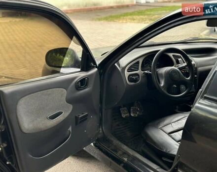 Черный ЗАЗ Ланос, объемом двигателя 1.39 л и пробегом 187 тыс. км за 2499 $, фото 6 на Automoto.ua