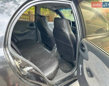 Черный ЗАЗ Ланос, объемом двигателя 1.39 л и пробегом 187 тыс. км за 2499 $, фото 12 на Automoto.ua