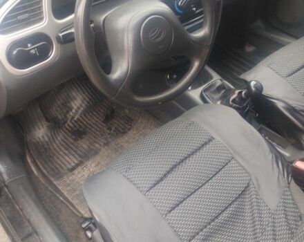 Чорний ЗАЗ Ланос, об'ємом двигуна 1.3 л та пробігом 226 тис. км за 1800 $, фото 5 на Automoto.ua