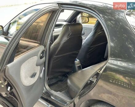 Черный ЗАЗ Ланос, объемом двигателя 1.39 л и пробегом 187 тыс. км за 2499 $, фото 8 на Automoto.ua