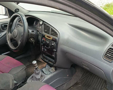 Черный ЗАЗ Ланос, объемом двигателя 1.5 л и пробегом 200 тыс. км за 2000 $, фото 1 на Automoto.ua