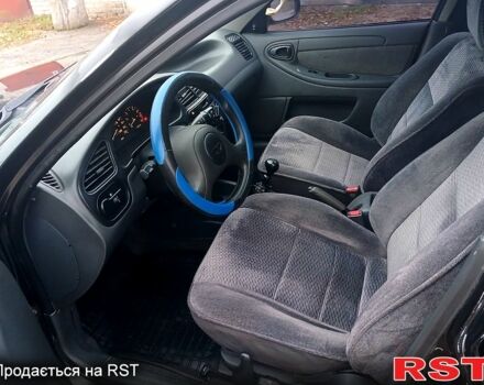 Черный ЗАЗ Ланос, объемом двигателя 1.5 л и пробегом 240 тыс. км за 3000 $, фото 6 на Automoto.ua