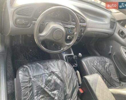 Черный ЗАЗ Ланос, объемом двигателя 1.35 л и пробегом 170 тыс. км за 2100 $, фото 6 на Automoto.ua