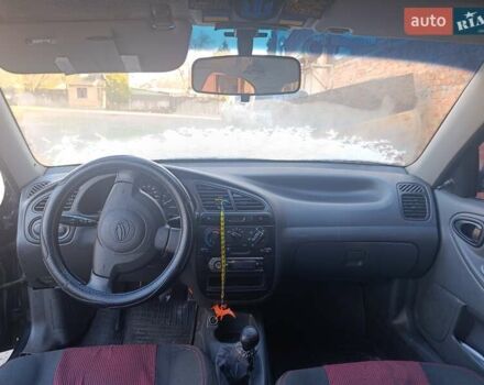 Черный ЗАЗ Ланос, объемом двигателя 1.5 л и пробегом 350 тыс. км за 1900 $, фото 7 на Automoto.ua