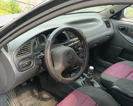 Чорний ЗАЗ Ланос, об'ємом двигуна 1.5 л та пробігом 200 тис. км за 2000 $, фото 1 на Automoto.ua