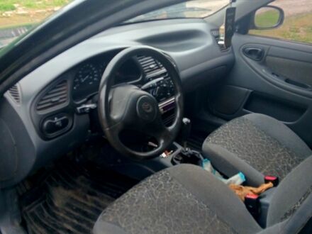 ЗАЗ Ланос 2011 у Бурыне на Automoto.ua Чорний ЗАЗ Ланос, об'ємом двигуна 15 л та пробігом 55 тис. км за 3100 $, фото 1 на Automoto.ua