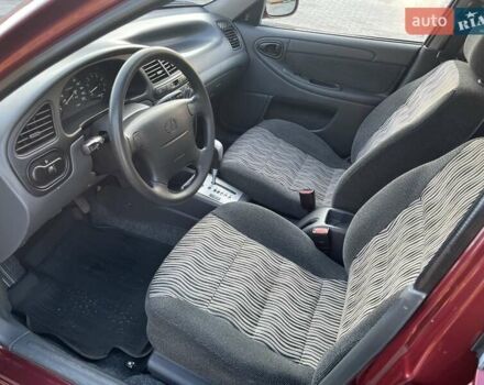 Красный ЗАЗ Ланос, объемом двигателя 1.4 л и пробегом 60 тыс. км за 4100 $, фото 7 на Automoto.ua